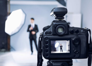 Closeup view of professional camera in studio