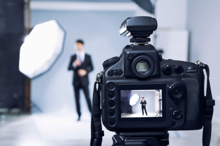 Closeup view of professional camera in studio