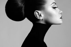 Beautiful elegant woman in black turtleneck